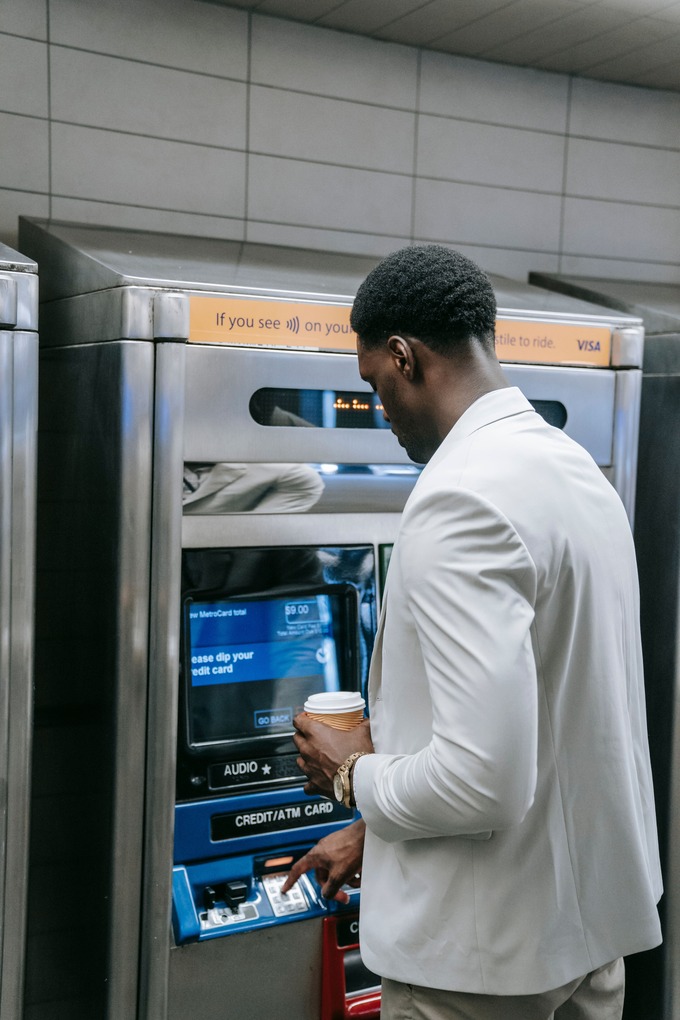 Customer using a contactless ATM